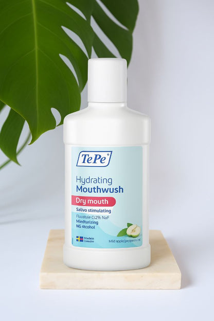 TePe kosteuttava suuvesi, omena-piparminttu - Flossie